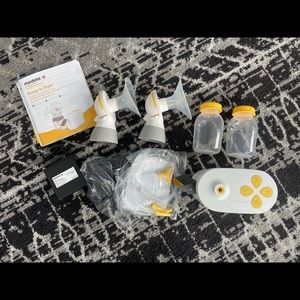 BRAND NEW ( just out of box) Medela Pump in Style